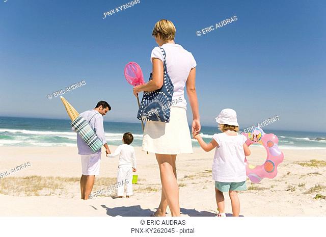 Family on vacations on the beach