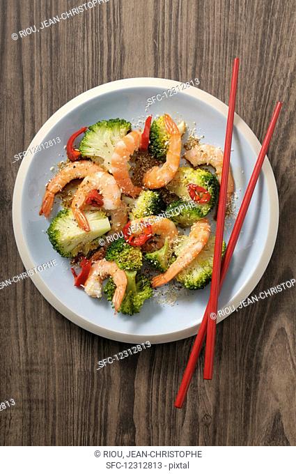 Sautéed broccoli with chilli prawns and coconut flakes (Asia)