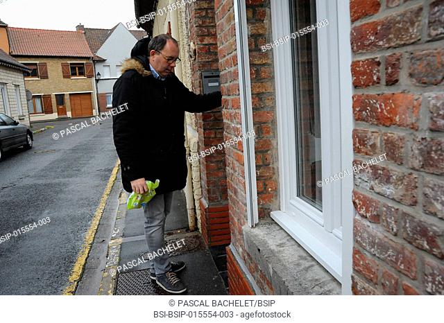 Reportage on a rural pharmacy technician during his home delivery round in Auxi-le-Château, France