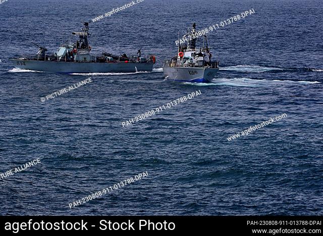 08 August 2023, Lebanon, Naqoura: Israeli navy boats patrol off the coast of the Lebanese village of Naqoura, during a tour conducted by the Lebanese army for...