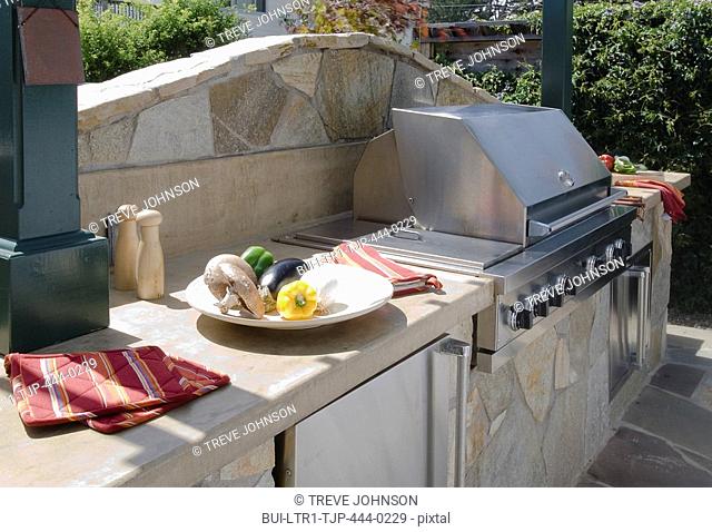 Outdoor grill and stone counter