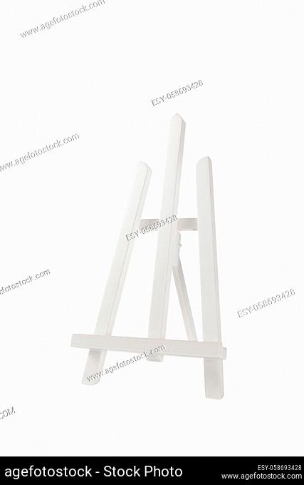 White easel in front of a white background