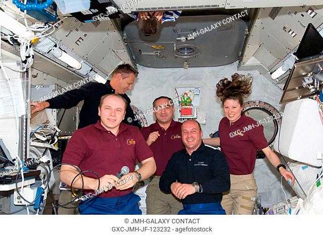 Five of the twelve crew members currently on the space shuttle AtlantisInternational Space Station tandem are pictured in the Kibo laboratory of the orbital...