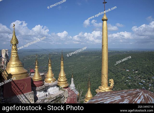 Myanmar: Bagan- Mount Popa- General-View of the shikaras of one of the temple with surrounding background