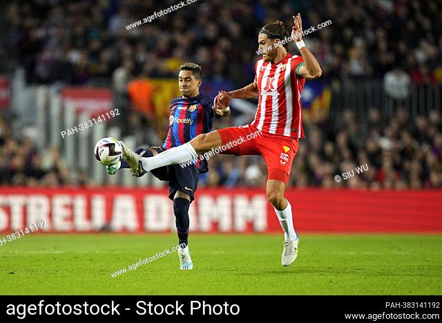 Raphinha (FC Barcelona) duels for the ball against Srdjan Babic (UD Almeria) during La Liga football match between FC Barcelona and UD Almeria