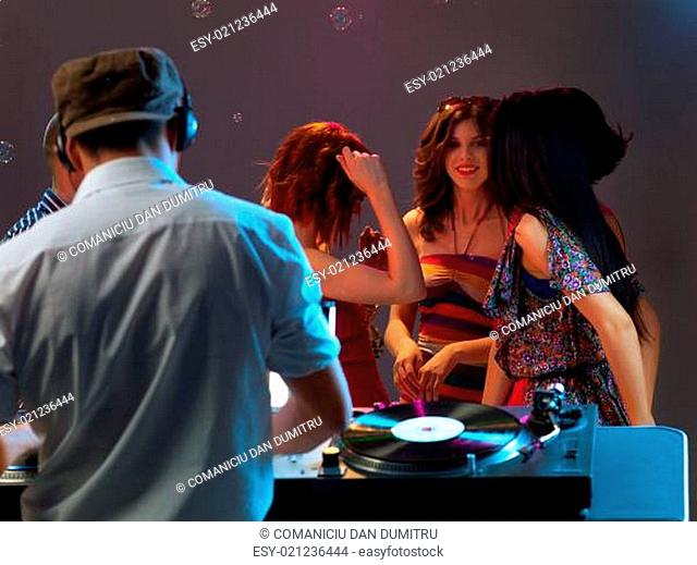 dj playing music in night club