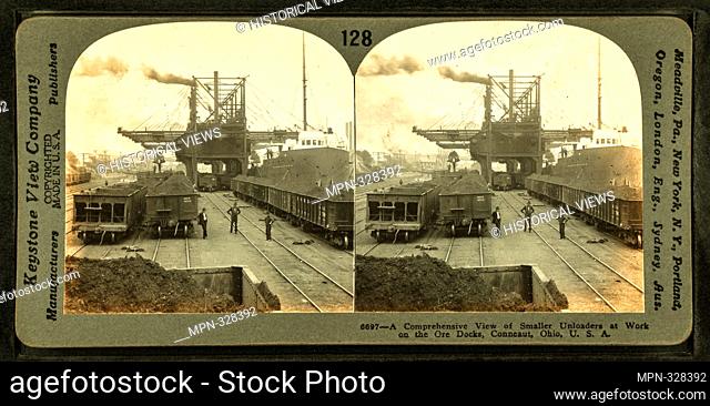 A comprehensive view of smaller uploaders at work on the oar docks, Conneaut, Ohio. Keystone View Company (Publisher). Robert N