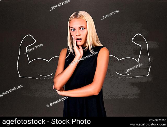 Young business woman with drawn powerful hands behind