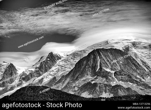 France, Haute Savoie, Mont Maudit (4465m left), Mont Blanc (4810m right), Dent du Gouter (3863m front) and clouds