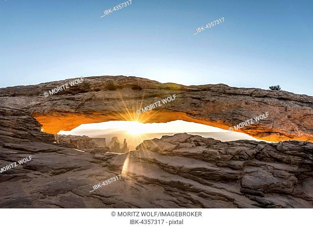 View through Natural Arch, Mesa Arch, Sunrise, Grand View Point Road, Island in the Sky, Canyonlands National Park, Moab, Utah, USA