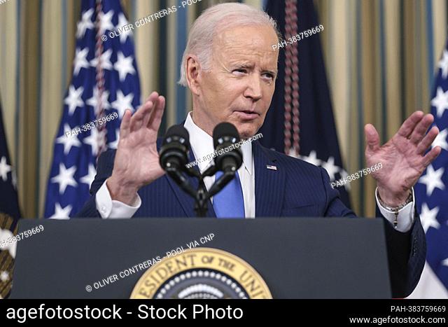 United States President Joe Biden delivers remarks and takes questions in the State Dining Room at The White House in Washington, DC