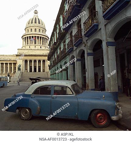 Antique car parked near the capitol building, Havana, Cuba