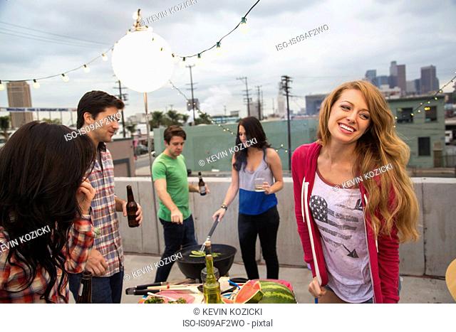 Young adult friends enjoying barbeque