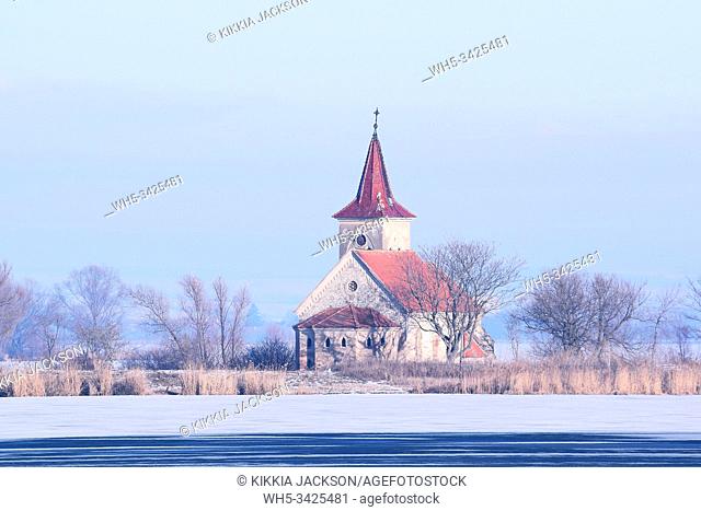 Abandoned Church of St. Linhart in the middle of the Frozen Lake. Musov. Czech Republic