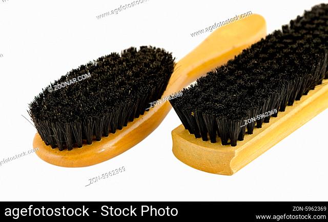 two different forms brush for shoes isolated on white background