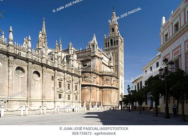 Cathedral and Giralda tower as seen from Plaza del Triunfo, Sevilla. Andalucia, Spain