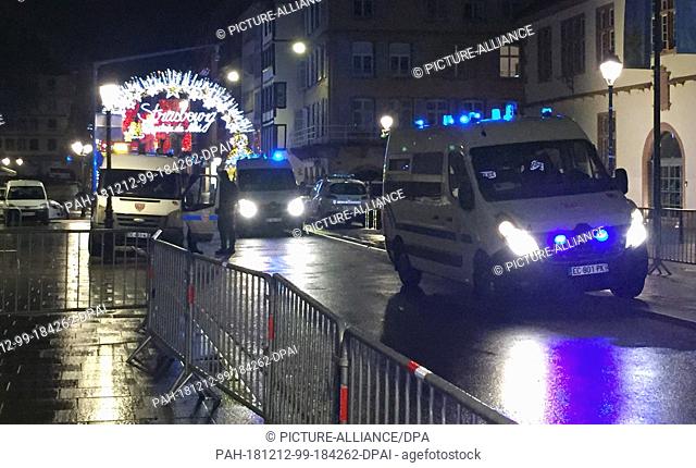 11 December 2018, France (France), Straßburg: Entrance Christmas market at the Pont du corbeau is blocked by the police. According to the prefecture