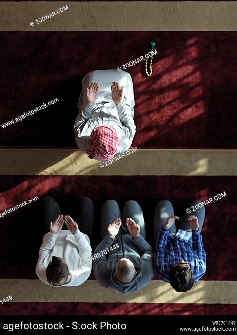 group of muslim people praying namaz in mosque worship Allah top view