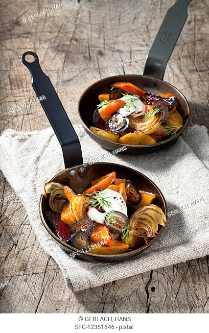 Stewed root vegetables with sour cream and dill