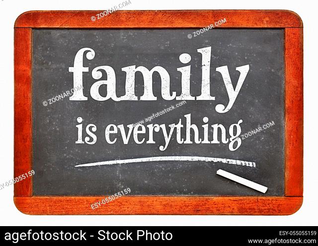 family is everything - white chalk text on a vintage slate blackboard