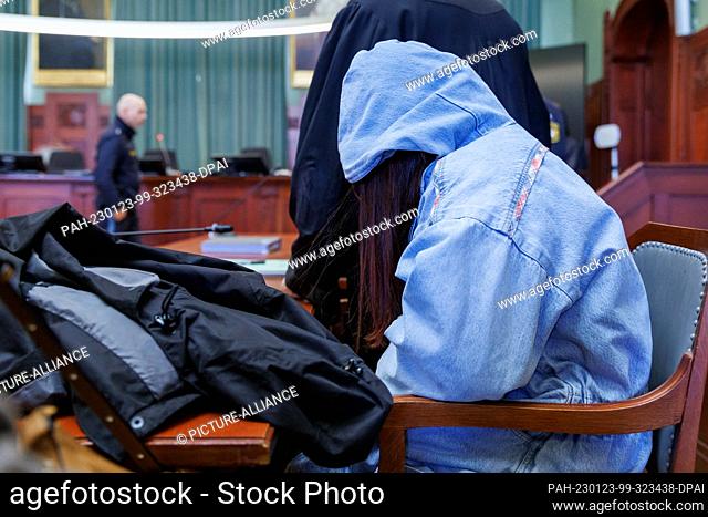 23 January 2023, Bavaria, Bayreuth: The accused 17-year-old young woman sits in the courtroom in the regional court. At the beginning of January 2022