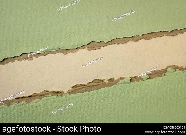 paper abstract in light green and brown tones with a copy space - sheets of bark and cotton rag paper, blank web banner