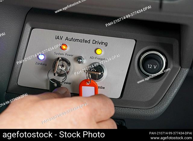14 July 2021, Saxony, Rackwitz: A control panel for switching the bus shuttle ""FLASH"" (Driverless Automated Shuttle) on and off