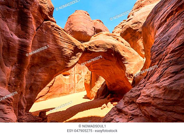 Scenic Landscape Arch between red rocky mountains in Arches National Park, Utah USA