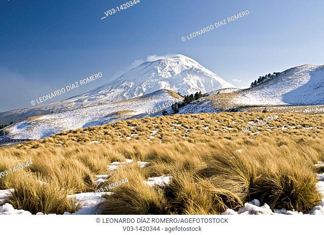 View of the Popocatepetl volcano with snow in the foreground