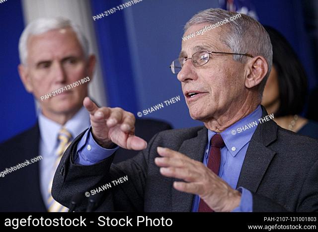 Director of the National Institute of Allergy and Infectious Diseases Dr. Anthony Fauci, with Vice President Mike Pence (L) and Surgeon General of the United...