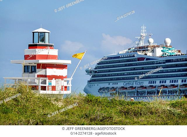 Florida, Miami Beach, South Pointe Park, Atlantic Ocean, departing, cruise ship, Carnival Victory, lifeguard station