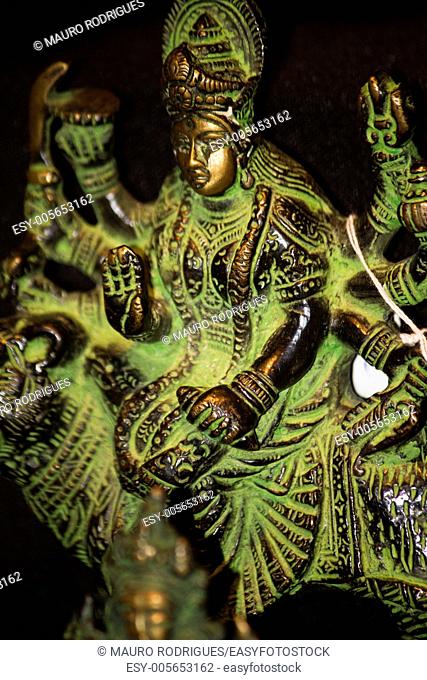 Close up view of a miniature Indian goddess sarasvati