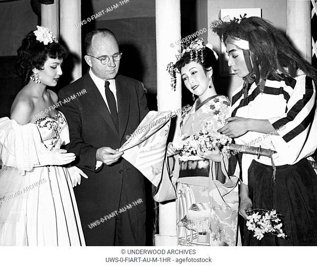 Tokyo, Japan: February 11, 1954.Author James Michener in front of the Imperial Theater where he attended the musical, Comedy of Miss Butterfly