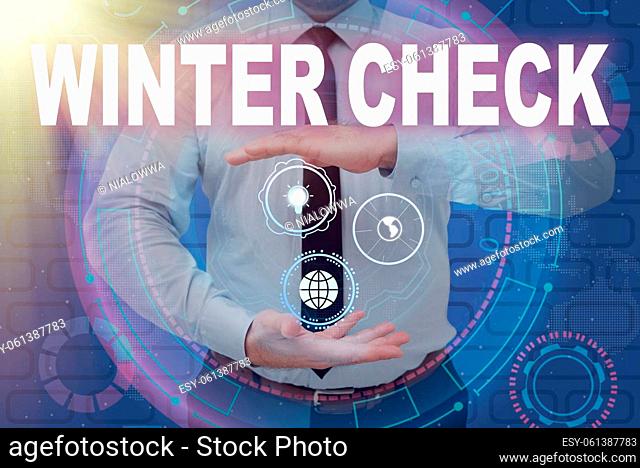Text sign showing Winter Check, Business overview Coldest Season Maintenance Preparedness Snow Shovel Hiemal Businessman in suit holding open palms represents...