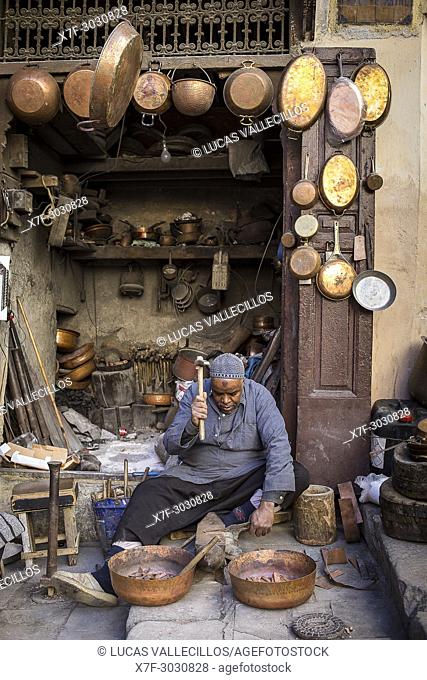 Metalworker, workshop in the Place as Seffarine. Fez. Morocco