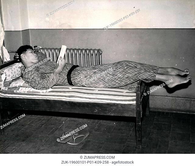 Dec. 12, 1968 - When you are nearely 8 feet in getting a suitable bed is quite problem especially Japan. Yoshimitsu Matsuzaka finds that any normal hospital bed...