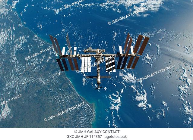 This is one of a series of images featuring the International Space Station photographed soon after the space shuttle Atlantis and the station began their...
