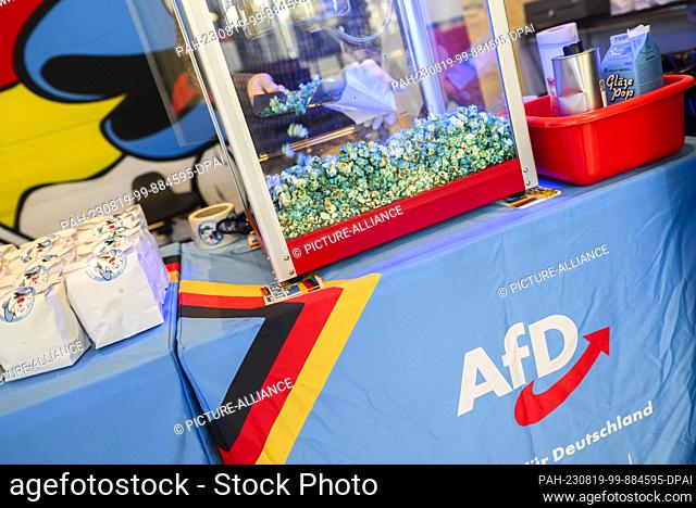 19 August 2023, Lower Saxony, Celle: Blue popcorn is sold in a ""fan store"" at the state party conference of the AfD Lower Saxony in the Congress Union Celle