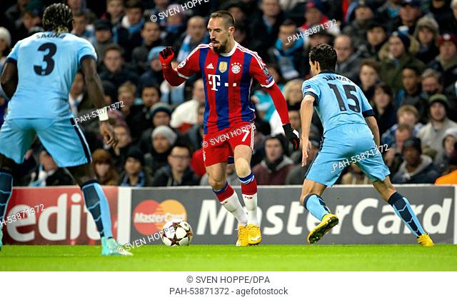 Franck Ribery (C) of Bayern Munich in action against Bacary Sagna (L) and Jesus Navas of Manchester City during the UEFA Champions League Group E soccer match...