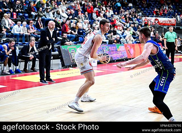 Antwerp's Jackson Rocky Kreuser and Mons' Leon Santelj pictured in action during a basketball match between Antwerp Giants and Mons Hainaut