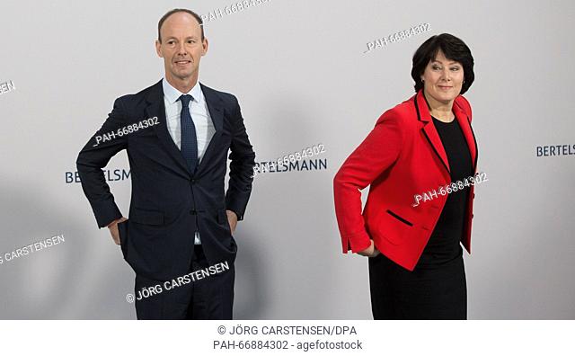 Bertelsmann SE CEO Thomas Rabe (L) stands next to Anke Schaeferkordt, board member and general manager of the media group RTL Germany
