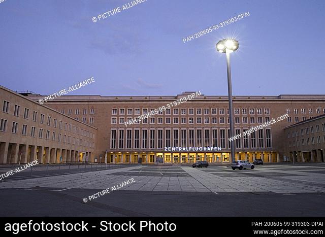 03 April 2020, Berlin: The main entrance of the former central airport Berlin-Tempelhof during the blue hour. The airport was in operation from 1923 until its...