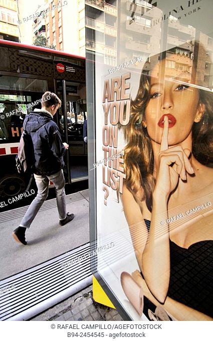 Advertising in a bus stop. Barcelona. Catalonia. Spain