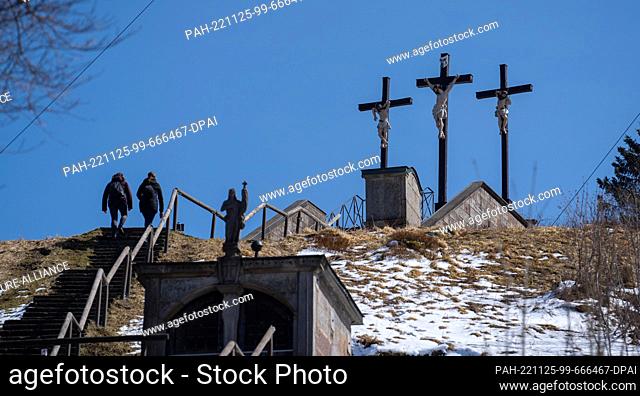 PRODUCTION - 11 April 2022, Bavaria, Bischofsheim In Der Rhön: A long staircase leads to the three Golgotha crosses on Cross Mountain