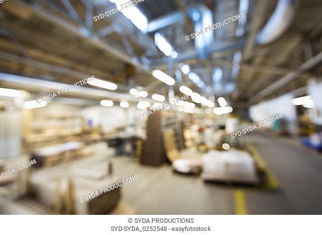 blurred factory workshop background