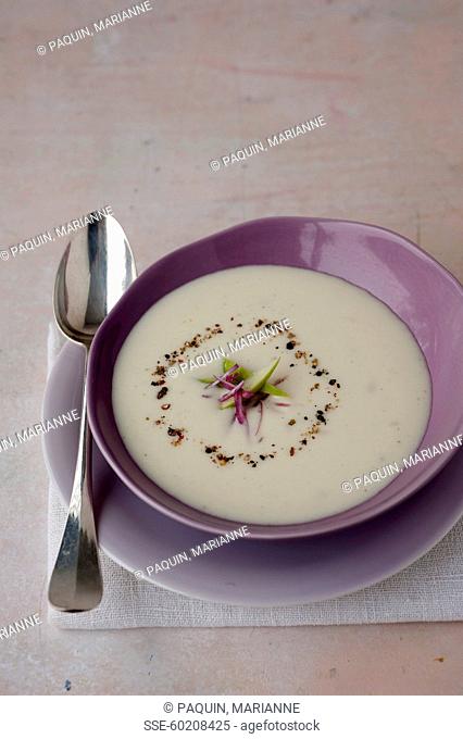 Young turnip and apple soup with pink pepper
