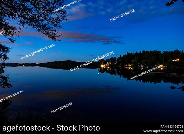 Stockholm, Sweden A midsummer midnight sun view over lake Malaren. | usage worldwide. - STOCKHOLM/Sweden