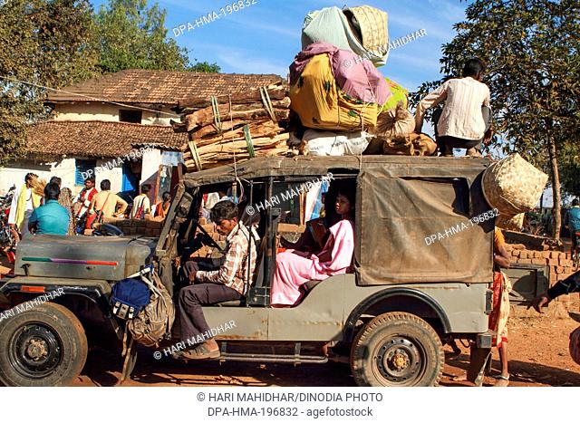 People sitting in jeep, haat market, bastar, chhattisgarh, india, asia