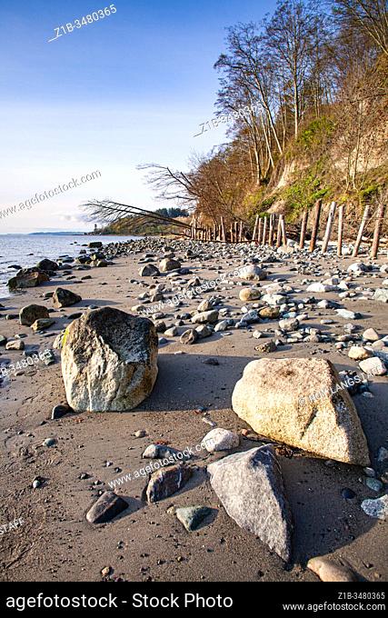 Beach erosion protective measures using logs and rocks on Vancouver Island