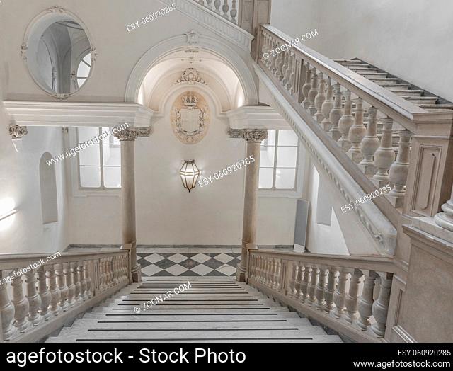 TURIN, ITALY - CIRCA MAY 2021: luxury staircase made of marble in an antique Italian palace